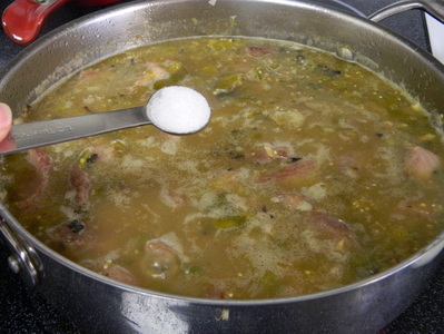 A one-pot Chile verde pork stew with steamed white rice Chile Verde con Carne (Chile Verde With Meat)