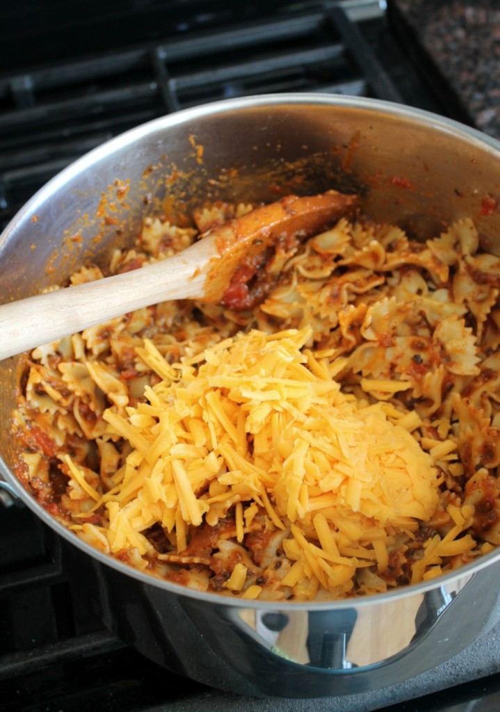 Bowtie pasta with a cheesy tomato sauce and a hint of chioptle chile