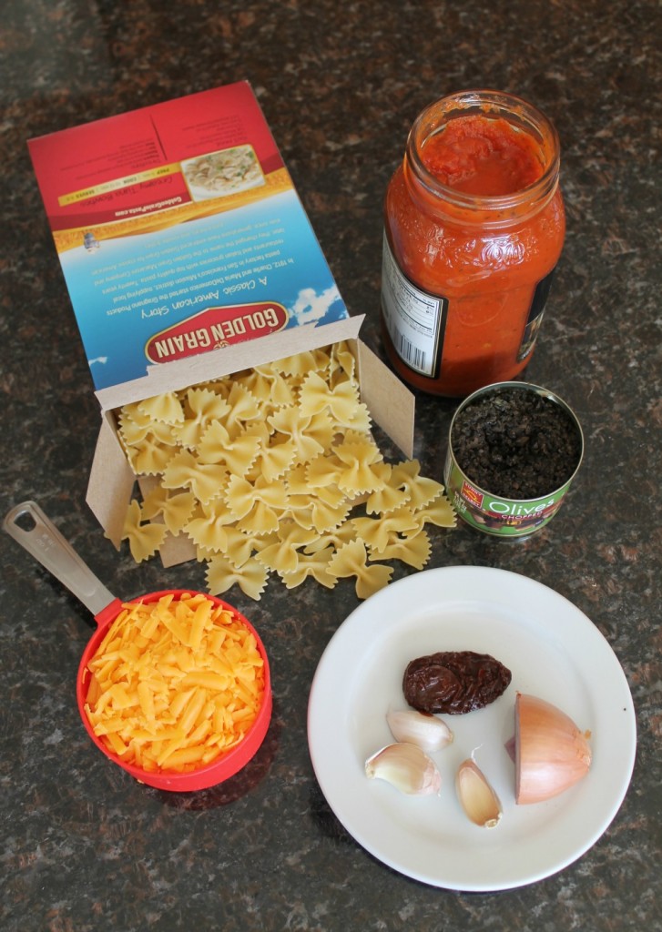 Bowtie pasta with a cheesy tomato sauce and a hint of chioptle chile