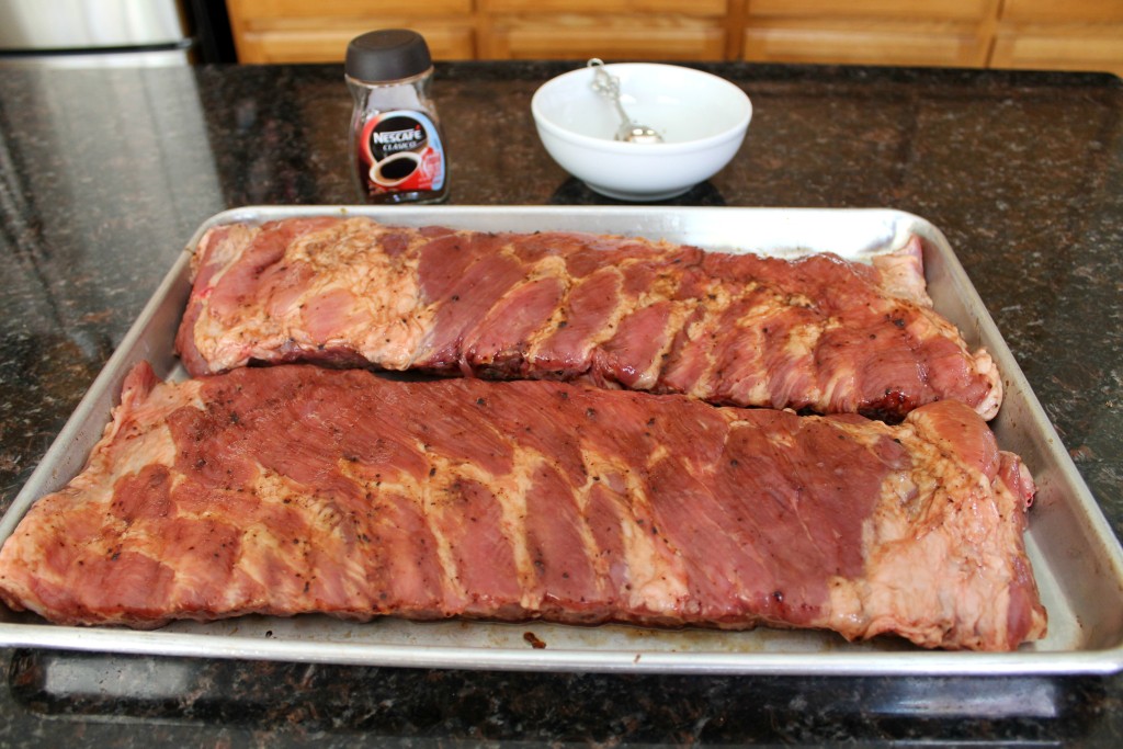 Homemade barbecue sauce on smoked ribs 4