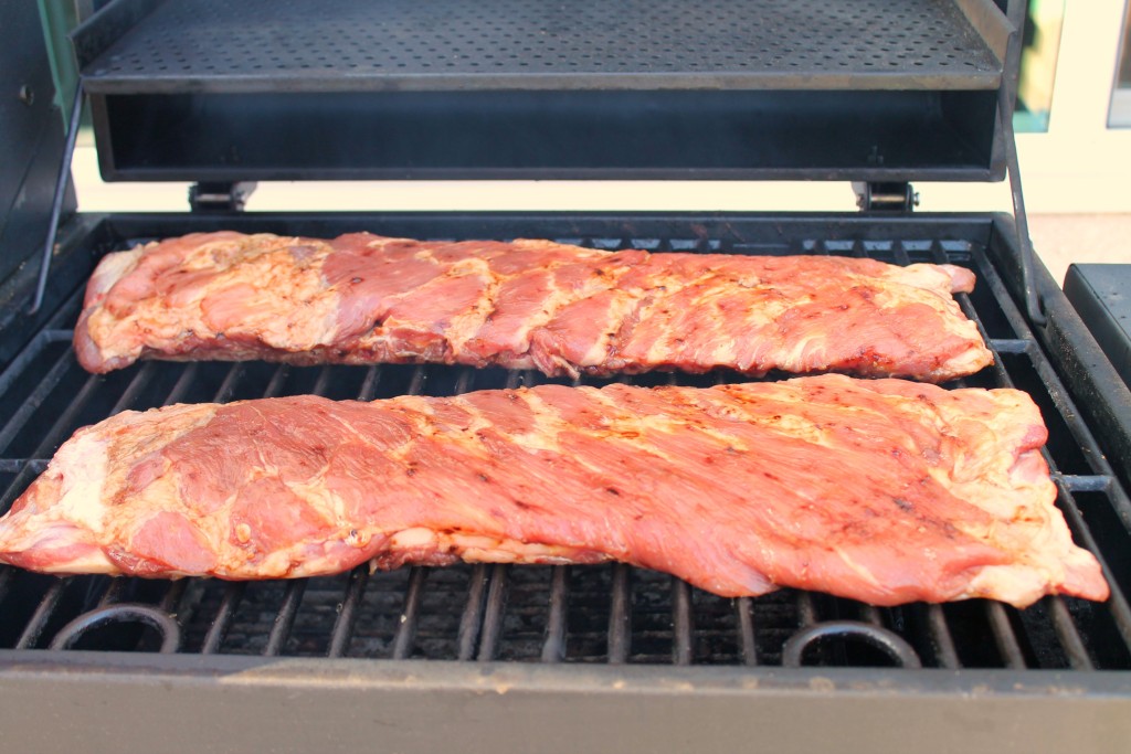 Homemade barbecue sauce on smoked ribs 5