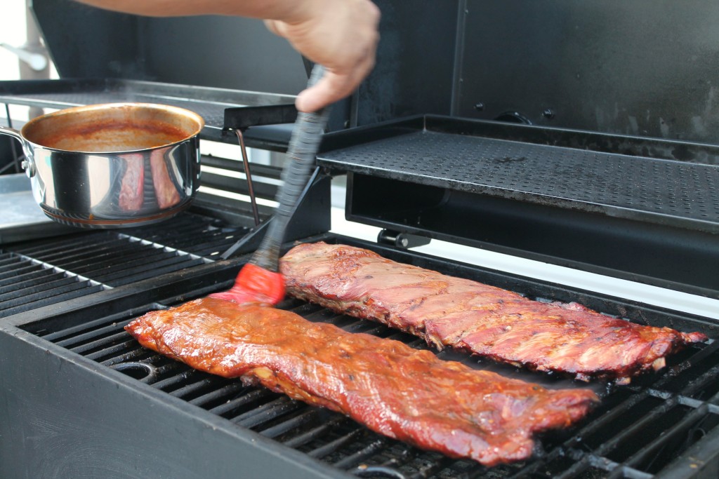 Homemade barbecue sauce on smoked ribs 6