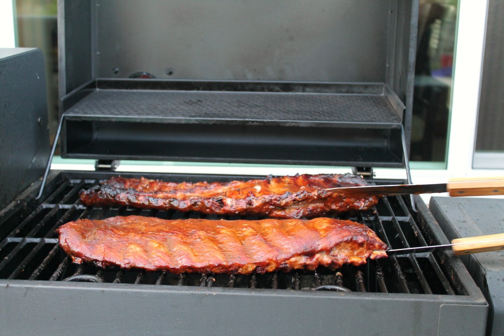 Homemade barbecue sauce on smoked ribs 8