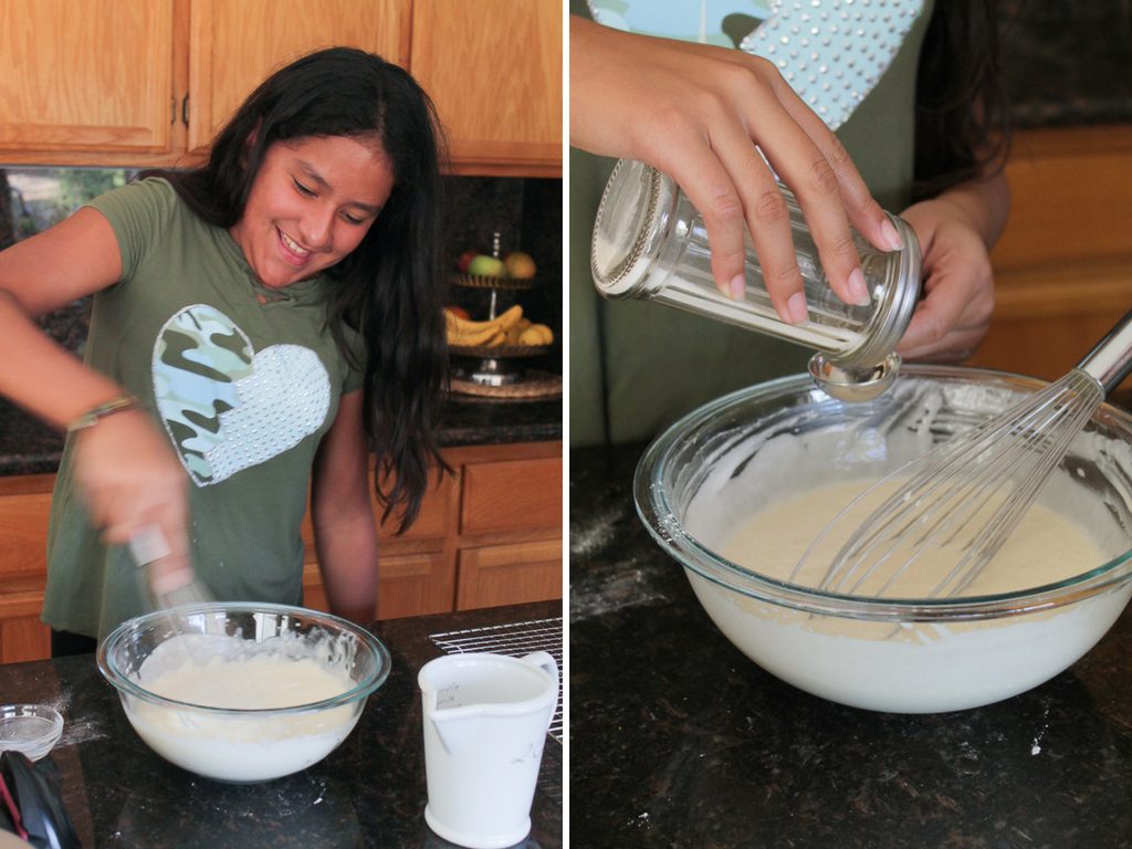 A girl mixing ingredients to make waffles.